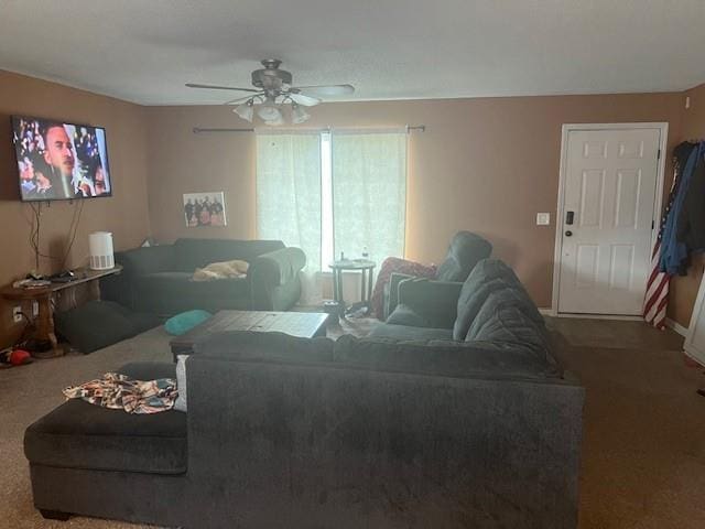 2216 Chanticleer St, Excelsior Springs, MO 64024 - living room with carpet floors and a ceiling fan