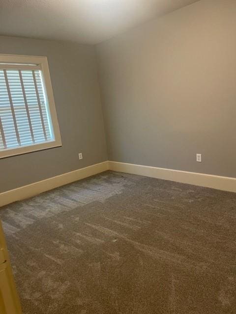 21162 147th St, Basehor, KS 66007 - spare room with baseboards and carpet