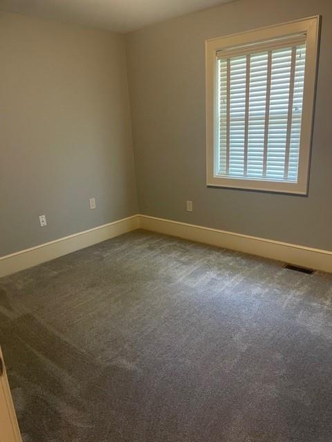 21162 147th St, Basehor, KS 66007 - unfurnished room featuring baseboards and carpet flooring