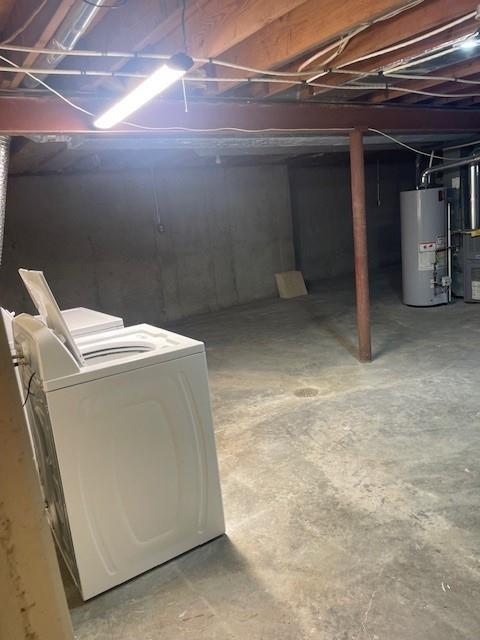 21162 147th St, Basehor, KS 66007 - unfinished below grade area featuring water heater and washer and dryer