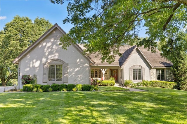 3644 W 127th Ter, Leawood, KS 66209 - view of front of house with a front lawn and stucco siding