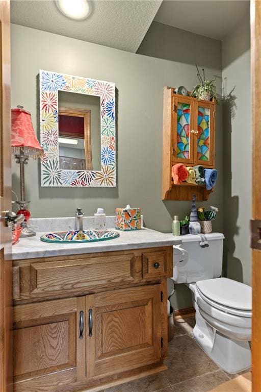 3644 W 127th Ter, Leawood, KS 66209 - bathroom featuring toilet, vanity, and tile patterned floors