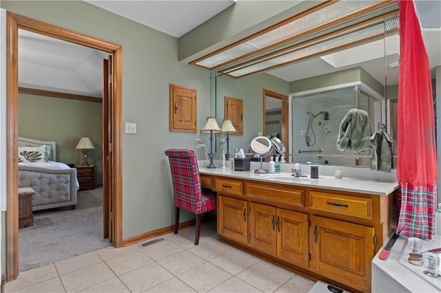 3644 W 127th Ter, Leawood, KS 66209 - full bathroom with vanity, a shower, tile patterned flooring, and baseboards