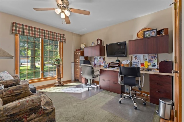 3644 W 127th Ter, Leawood, KS 66209 - home office featuring a ceiling fan, baseboards, and light carpet