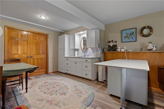 3644 W 127th Ter, Leawood, KS 66209 - bathroom featuring wood finished floors, tasteful backsplash, recessed lighting, and vanity