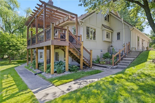 3644 W 127th Ter, Leawood, KS 66209 - view of front facade featuring stairs, a pergola, a wooden deck, and a front lawn