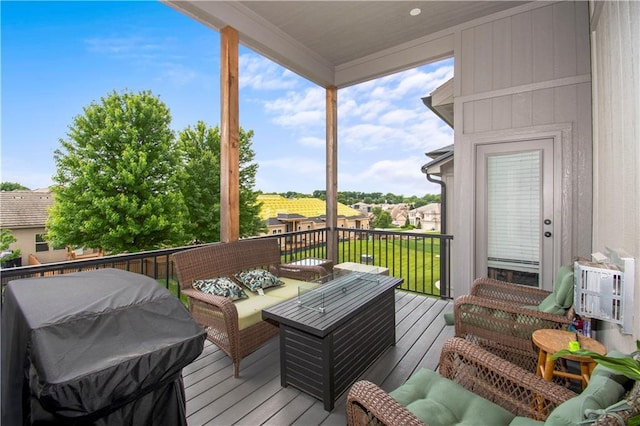 807 NE Algonquin St Unit B, Lees Summit, MO 64064 - wooden deck featuring an outdoor living space and a grill