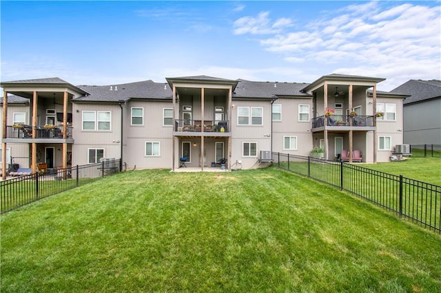 807 NE Algonquin St Unit B, Lees Summit, MO 64064 - rear view of property with a balcony, central air condition unit, and a patio