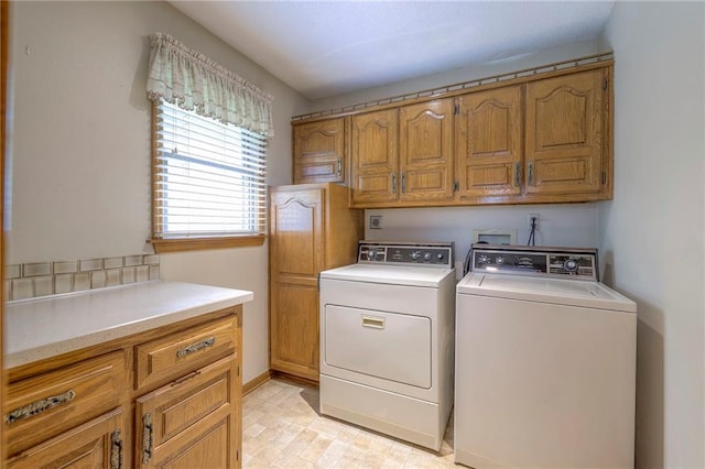 25908 Colbern Rd, Lees Summit, MO 64086 - laundry room with cabinet space, separate washer and dryer, and baseboards