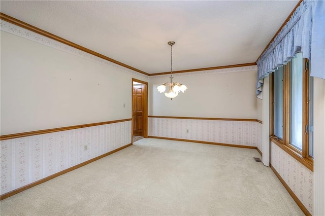 25908 Colbern Rd, Lees Summit, MO 64086 - carpeted spare room featuring wallpapered walls, a chandelier, crown molding, and baseboards