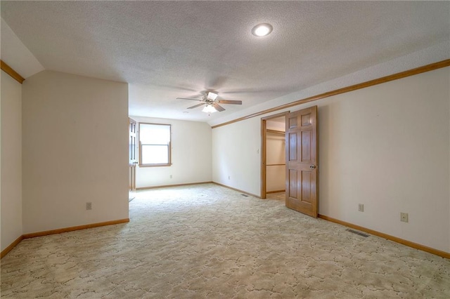 25908 Colbern Rd, Lees Summit, MO 64086 - unfurnished room with ceiling fan, light colored carpet, a textured ceiling, and baseboards