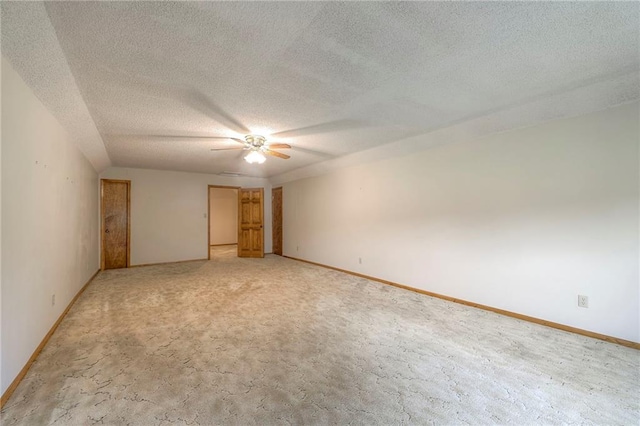 25908 Colbern Rd, Lees Summit, MO 64086 - empty room with ceiling fan, baseboards, a textured ceiling, and light colored carpet