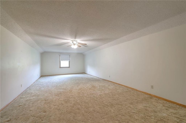 25908 Colbern Rd, Lees Summit, MO 64086 - unfurnished room with ceiling fan, carpet, a textured ceiling, and baseboards