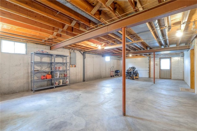 25908 Colbern Rd, Lees Summit, MO 64086 - below grade area featuring healthy amount of natural light and electric panel
