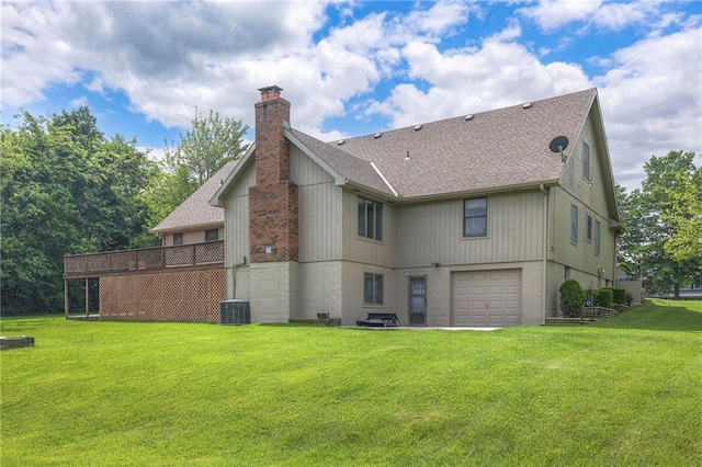 25908 Colbern Rd, Lees Summit, MO 64086 - rear view of house featuring a shingled roof, a chimney, a yard, an attached garage, and central air condition unit