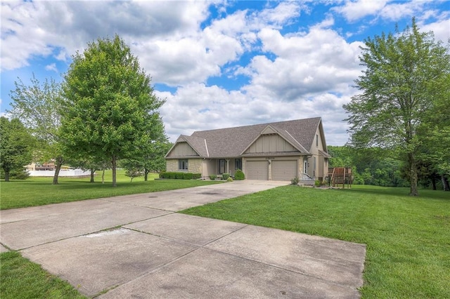 25908 Colbern Rd, Lees Summit, MO 64086 - view of front of home with an attached garage, a front yard, driveway, and board and batten siding