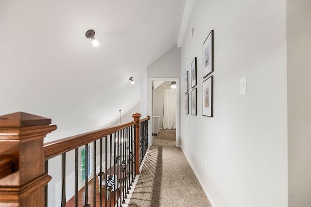 8911 W 104th St, Overland Park, KS 66212 - hallway with vaulted ceiling, carpet flooring, and baseboards