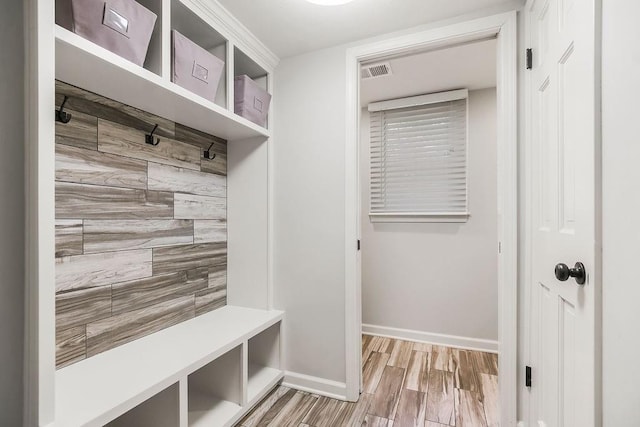 8911 W 104th St, Overland Park, KS 66212 - mudroom with light wood-style floors and baseboards