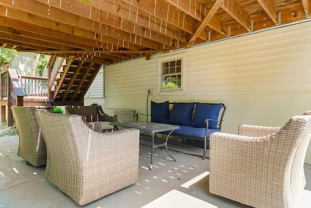 8911 W 104th St, Overland Park, KS 66212 - view of patio with stairs, an outdoor living space, and outdoor dining area