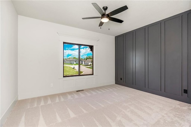 17556 Acton St, Overland Park, KS 66085 - carpeted spare room featuring ceiling fan