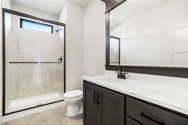 17556 Acton St, Overland Park, KS 66085 - bathroom with toilet, a stall shower, and vanity