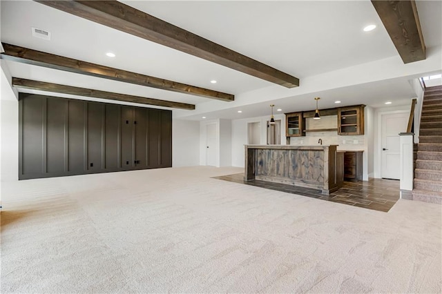 17556 Acton St, Overland Park, KS 66085 - unfurnished living room with recessed lighting, stairway, wet bar, carpet flooring, and beamed ceiling