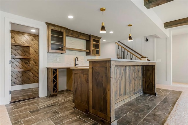 17556 Acton St, Overland Park, KS 66085 - indoor wet bar featuring pendant lighting, recessed lighting, stairway, and decorative backsplash