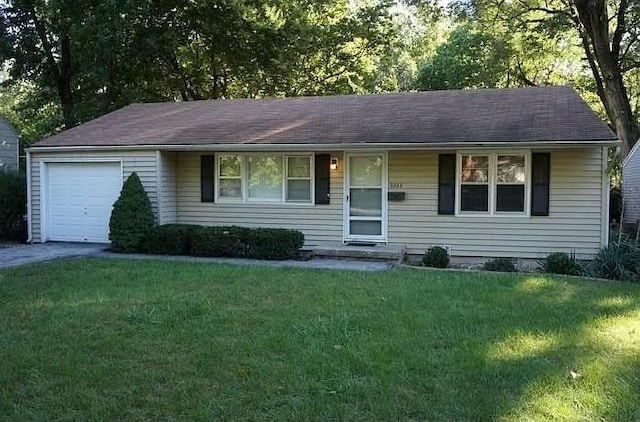 5333 Outlook St, Mission, KS 66202 - ranch-style house featuring a garage and a front lawn