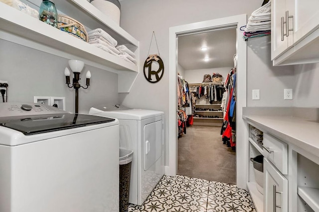 9305 SW Sushi Cir, Lees Summit, MO 64064 - laundry room featuring independent washer and dryer, cabinet space, and light colored carpet