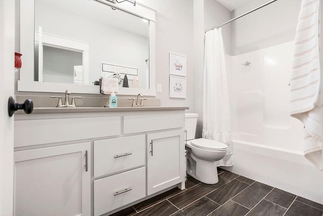 9305 SW Sushi Cir, Lees Summit, MO 64064 - full bathroom featuring double vanity, shower / bath combo, and toilet