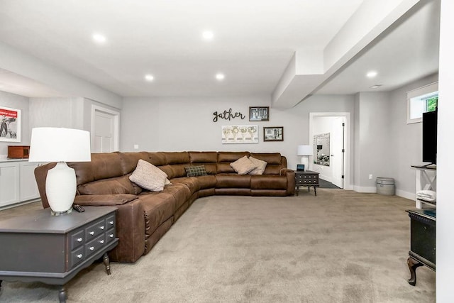 9305 SW Sushi Cir, Lees Summit, MO 64064 - living area with recessed lighting, light colored carpet, and baseboards