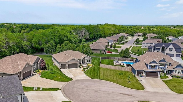9305 SW Sushi Cir, Lees Summit, MO 64064 - aerial perspective of suburban area featuring a pool area
