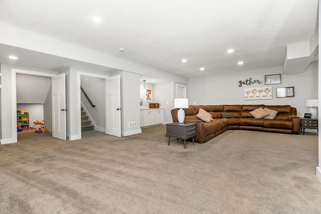9305 SW Sushi Cir, Lees Summit, MO 64064 - living area featuring stairway, carpet flooring, and recessed lighting