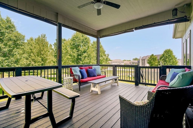 9305 SW Sushi Cir, Lees Summit, MO 64064 - wooden terrace with outdoor lounge area, a ceiling fan, and outdoor dining area