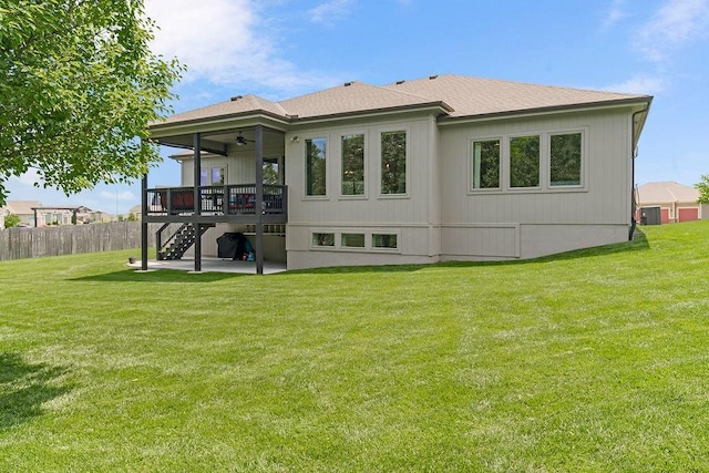 9305 SW Sushi Cir, Lees Summit, MO 64064 - rear view of house featuring a ceiling fan, stairs, a patio area, a shingled roof, and a wooden deck