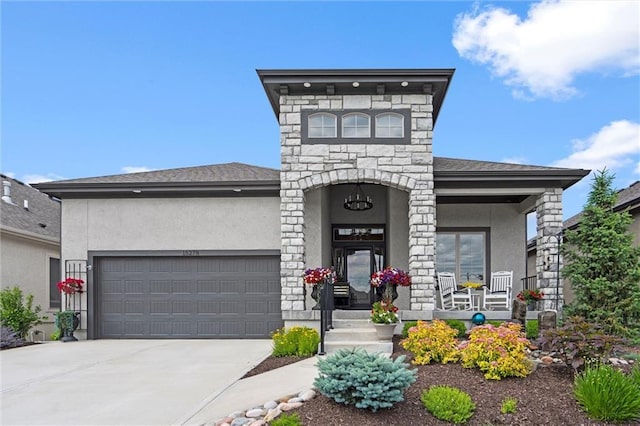 15278 W 173rd St, Olathe, KS 66062 - view of front of property featuring stucco siding, an attached garage, driveway, and stone siding