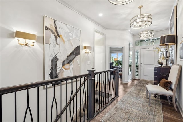 15278 W 173rd St, Olathe, KS 66062 - hallway featuring an upstairs landing, a chandelier, ornamental molding, and wood finished floors