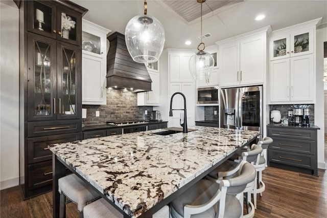 15278 W 173rd St, Olathe, KS 66062 - kitchen with dark wood-type flooring, white cabinetry, stainless steel appliances, and recessed lighting