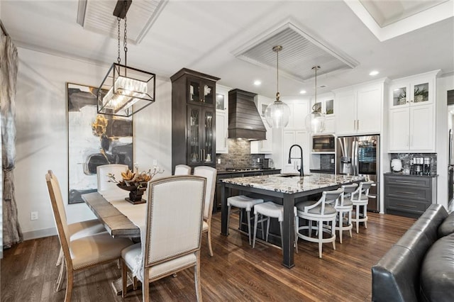 15278 W 173rd St, Olathe, KS 66062 - dining space featuring recessed lighting, dark wood-style floors, and a chandelier