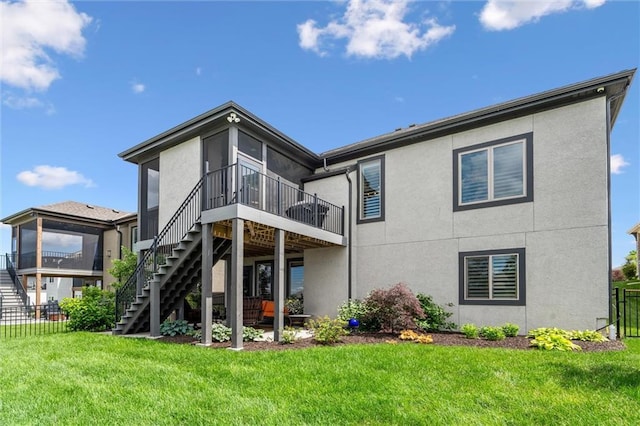 15278 W 173rd St, Olathe, KS 66062 - rear view of house with stairway, stucco siding, and a sunroom
