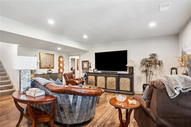 15278 W 173rd St, Olathe, KS 66062 - living room featuring wood finished floors, stairs, and recessed lighting