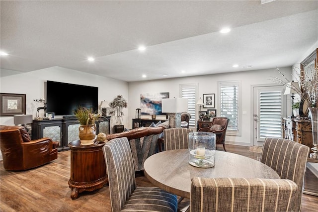 15278 W 173rd St, Olathe, KS 66062 - dining area with wood finished floors, recessed lighting, a textured ceiling, and baseboards