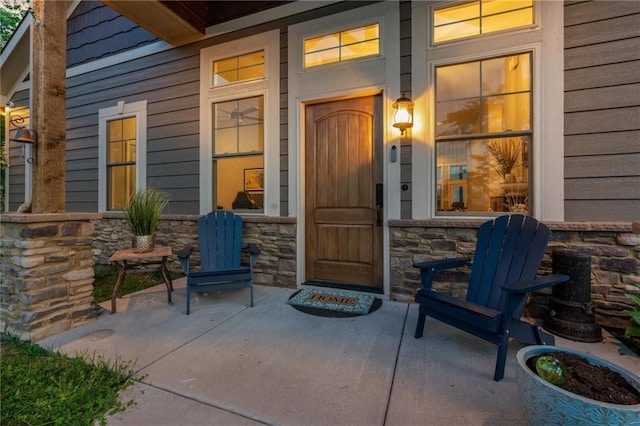 9425 NE 188th St, Trimble, MO 64492 - property entrance with stone siding and covered porch