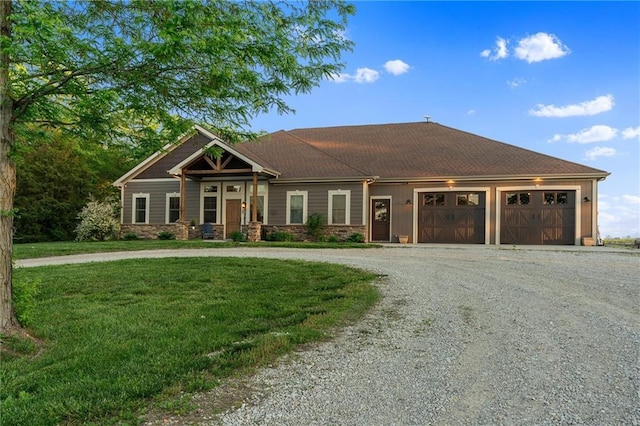 9425 NE 188th St, Trimble, MO 64492 - view of front of property with curved driveway, an attached garage, a front lawn, stone siding, and a shingled roof