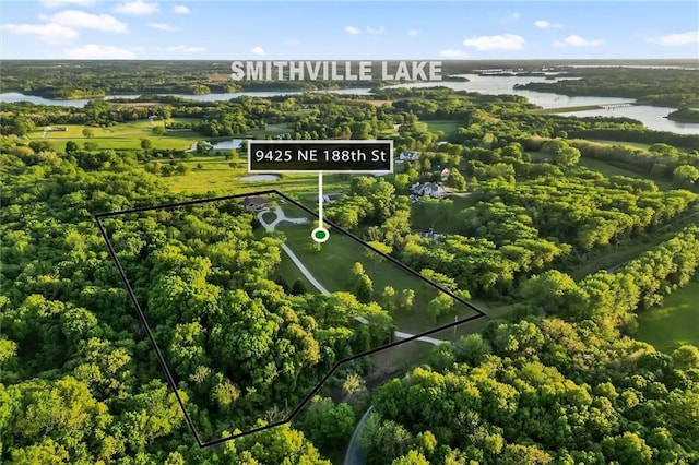 9425 NE 188th St, Trimble, MO 64492 - aerial view of property and surrounding area featuring a large body of water and property boundaries highlighted
