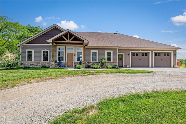 9425 NE 188th St, Trimble, MO 64492 - view of front of house with stone siding, driveway, a garage, and a front lawn