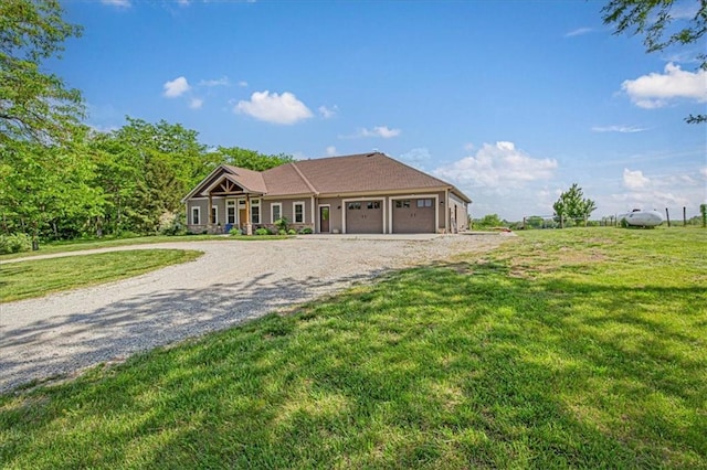 9425 NE 188th St, Trimble, MO 64492 - ranch-style home with driveway, an attached garage, and a front lawn