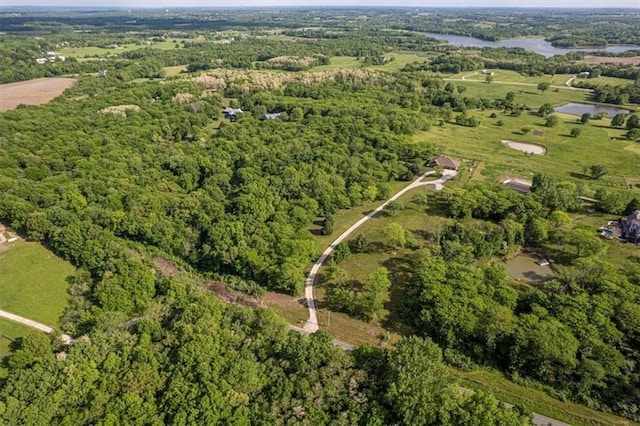 9425 NE 188th St, Trimble, MO 64492 - aerial view of property and surrounding area featuring a heavily wooded area
