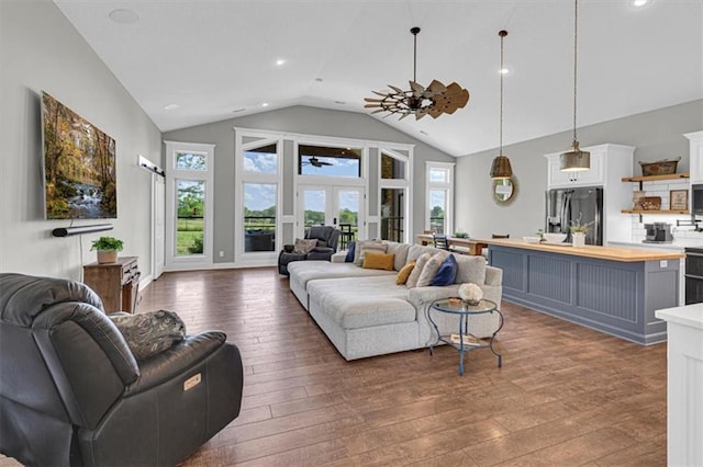 9425 NE 188th St, Trimble, MO 64492 - living area featuring hardwood / wood-style floors, ceiling fan, high vaulted ceiling, recessed lighting, and french doors