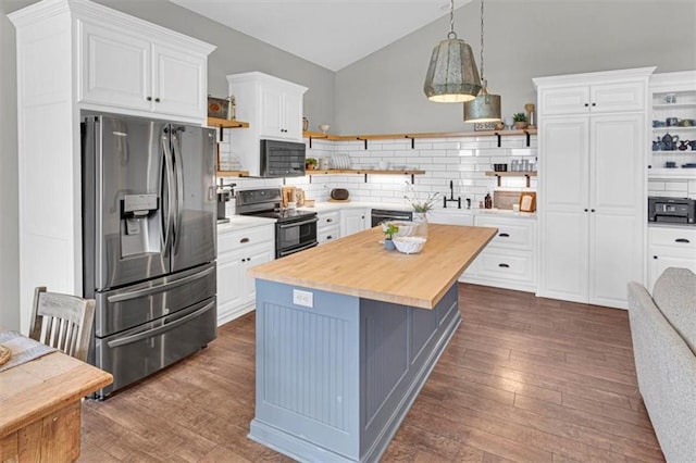 9425 NE 188th St, Trimble, MO 64492 - kitchen featuring stainless steel fridge with ice dispenser, open shelves, black range with electric cooktop, lofted ceiling, and white cabinetry
